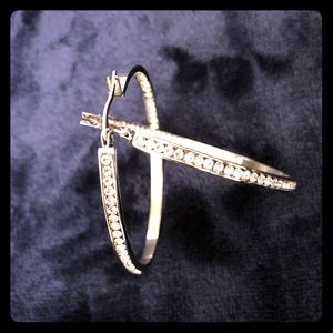 Hoop pierced earrings with crystals.